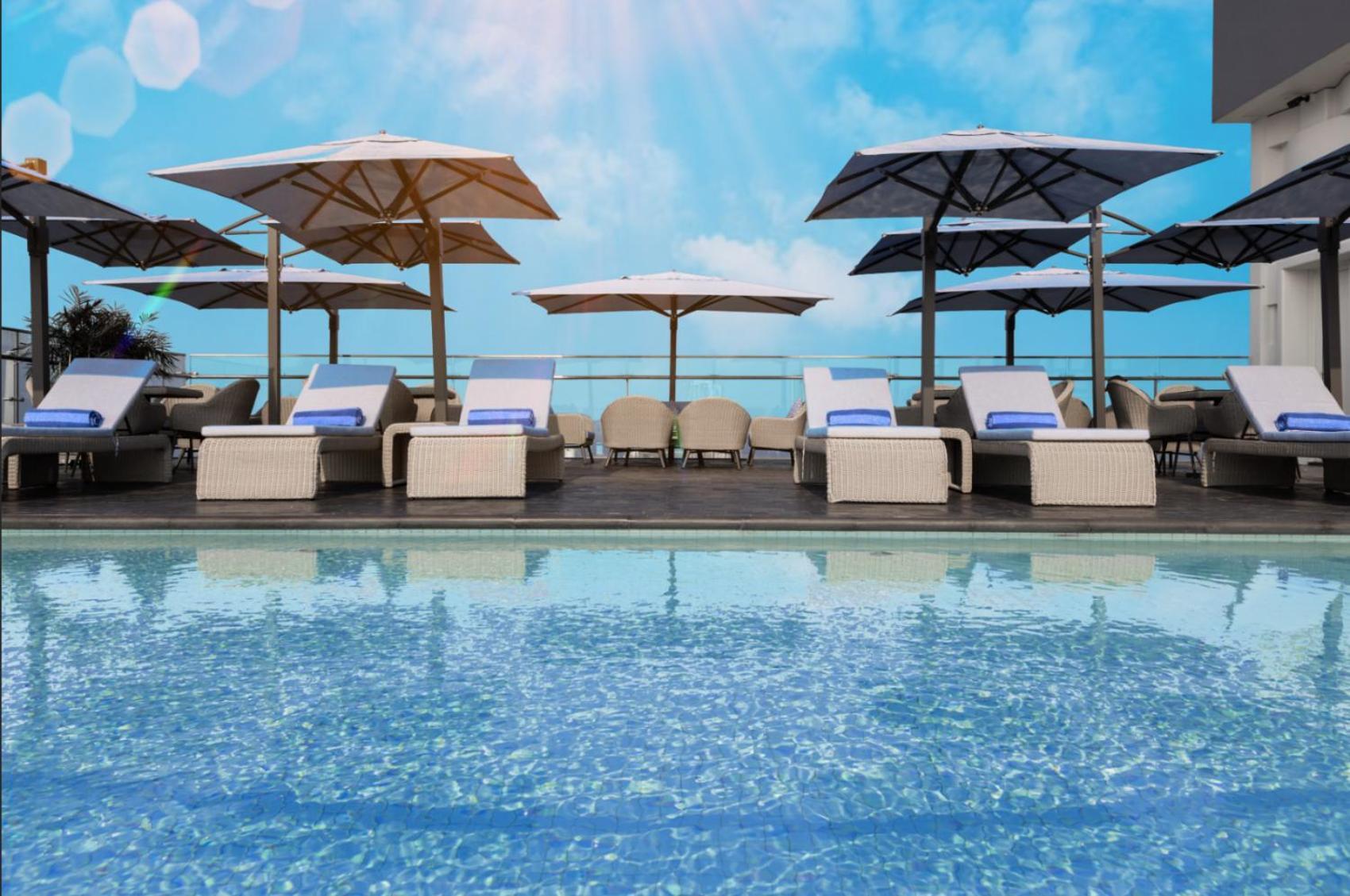 Wink Icon Hotel Danang Riverside - Luxury Suites - 24Hrs Stay & Rooftop Pool Bar Eksteriør billede